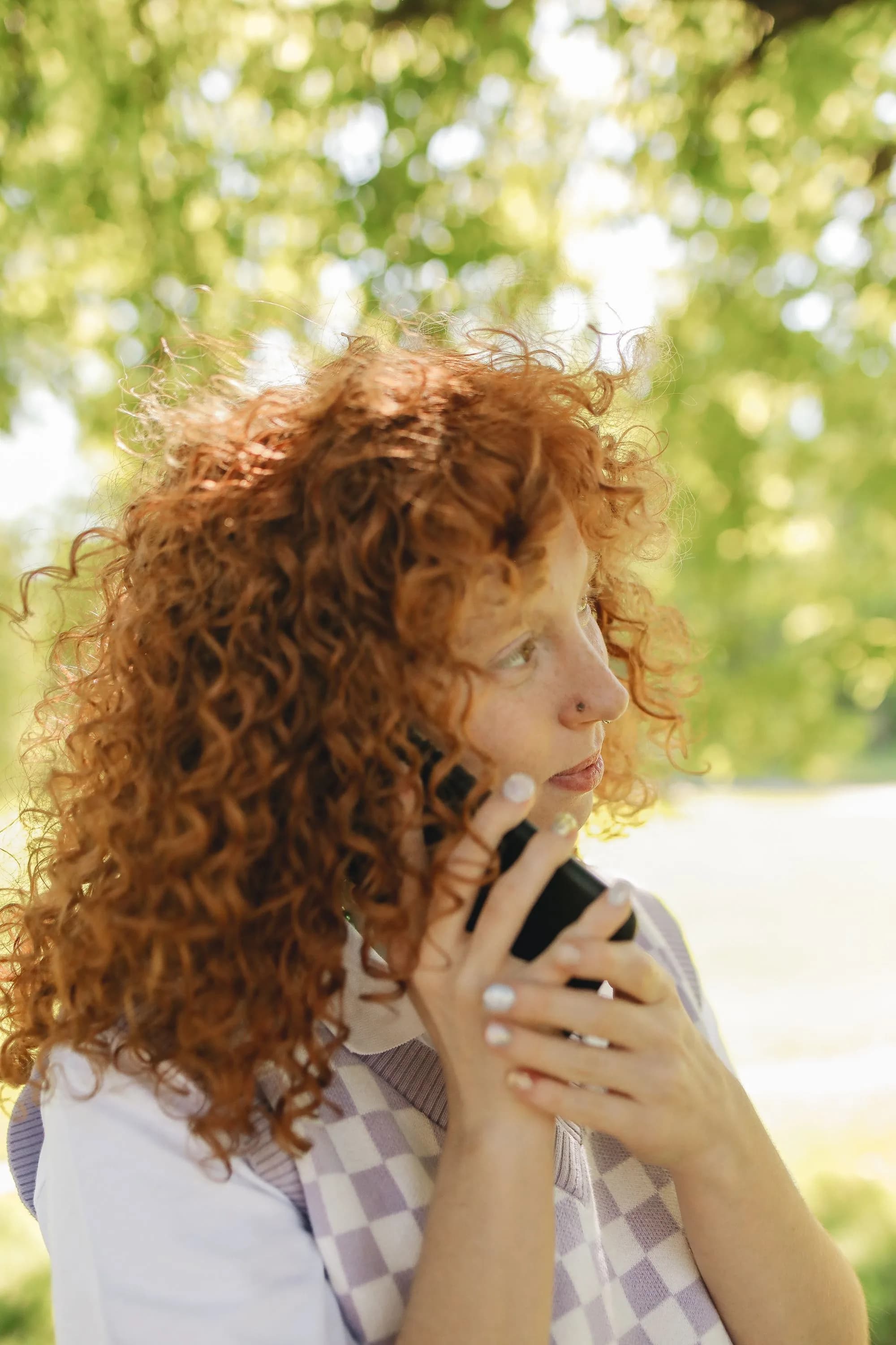 A person speaking with a Gaia Fertility Navigator on the phone